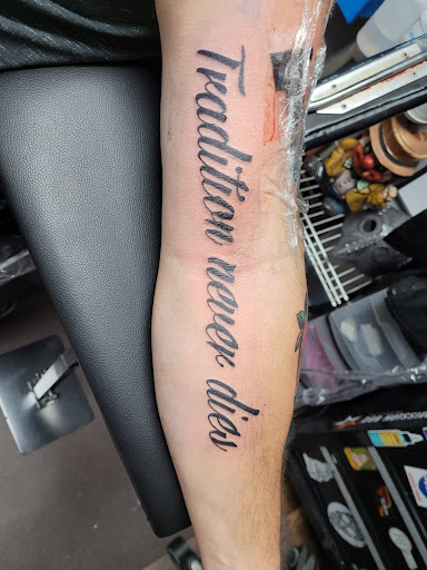 Explore fishing pole tattoo ideas, creative tattoo ideas in Bradenton, available at Memory Lane Tattoo Co.