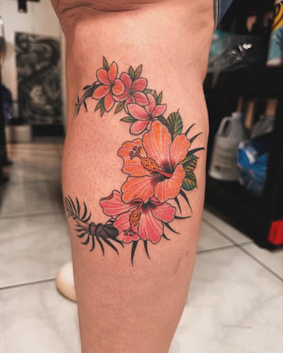 Explore dog tag tattoo ideas, creative tattoo ideas in Honolulu, available at Sacred Art Tattoo Waikiki