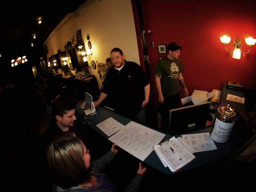 Explore moon tattoo ideas for guys, creative tattoo ideas in Lafayette, available at Evil Genius Tattoo Club