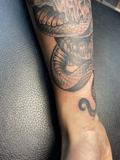 Explore sloth tattoo ideas, creative tattoo ideas in Loveland, available at Single Needle Tattoo