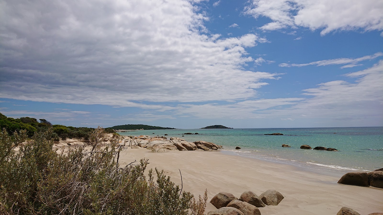 Fotografija Stumpys Bay z svetel pesek površino