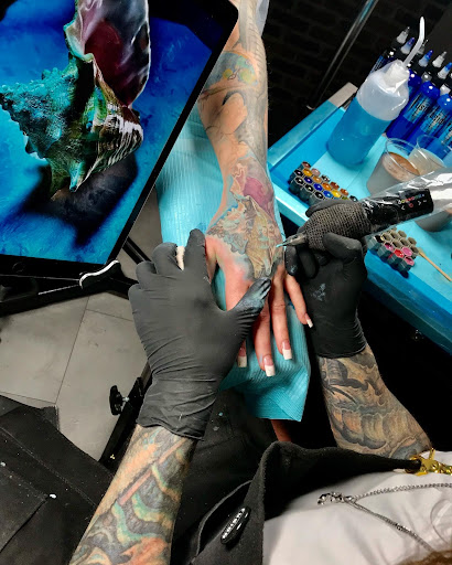 Explore solid tattoo ideas, creative tattoo ideas in Marietta, available at Sink or Swim Studio and Gallery