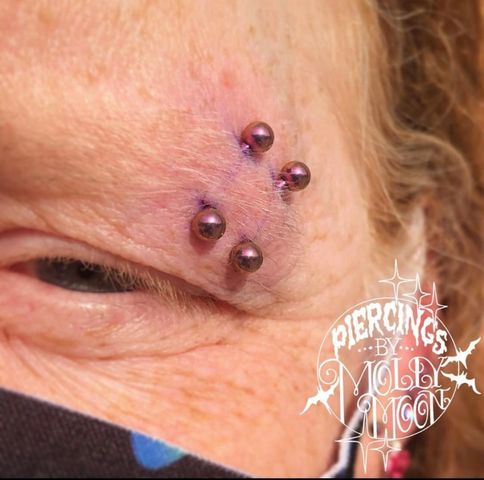 Explore foot tattoo ideas for men, creative tattoo ideas in Oshkosh, available at Piercings by Molly Moon at 920 Tattoo and Piercing