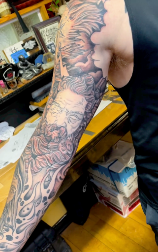 Explore pin up girl tattoo ideas, creative tattoo ideas in Milwaukee, available at Mike Davenport Tattoo