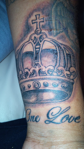 Explore cover up ideas for ankle tattoos, creative tattoo ideas in East Northport, available at Tormented Souls