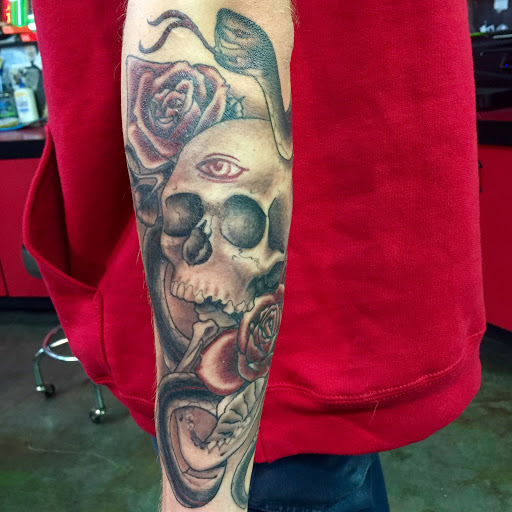 Explore leg tattoo idea for men, creative tattoo ideas in Reno, available at Aces Tattoo