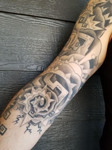 Explore ideas for tattoo sleeve theme, creative tattoo ideas in Swannanoa, available at Iron Wolves Tattoo