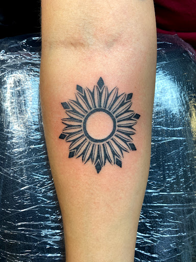 Explore women's arm tattoo ideas, creative tattoo ideas in Warner Robins, available at Untold Pain Tattoo Studio