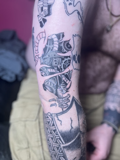 Explore scroll tattoo ideas, creative tattoo ideas in Cincinnati, available at Enchanted Ink