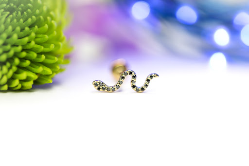 Explore sweet pea tattoo ideas, creative tattoo ideas in Lees Summit, available at Radiance Piercing