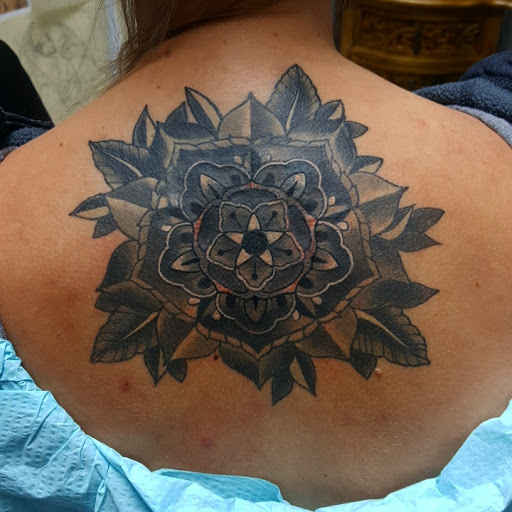 Explore gun tattoo ideas for men, creative tattoo ideas in Leesburg, available at Trademark Body Art