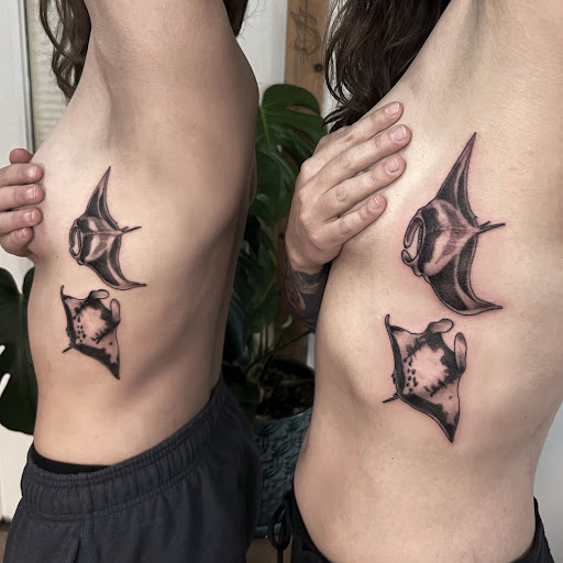 Explore throat tattoo ideas for men, creative tattoo ideas in Lopez Island, available at Soot and Bone Body Art Studio