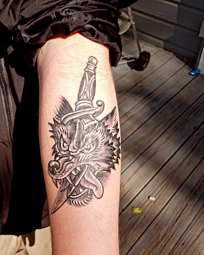 Explore inner bicep tattoo ideas for men, creative tattoo ideas in Gladewater, available at Lady Luck Tattoo Parlor