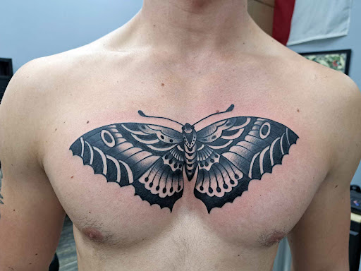 Explore full neck tattoos ideas, creative tattoo ideas in El Paso, available at American Tattoo Society of Ft Bliss
