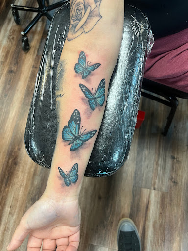 Explore small ear tattoo ideas, creative tattoo ideas in Nazareth, available at Nocturnal Tattoo