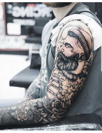 Explore male forearm tattoo ideas, creative tattoo ideas in Ambler, available at Tattoo GalaxyAmbler Piercing & Custom Tattoos