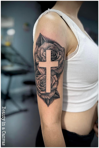 Explore arm tribal tattoo cover up ideas, creative tattoo ideas in Ocala, available at Beauty in a Canvas Tattoo and Art Gallery