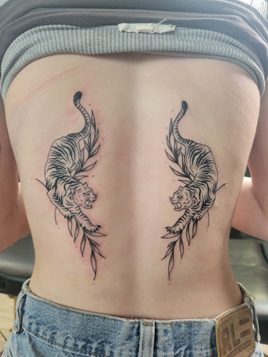 Explore forearm rose tattoo ideas, creative tattoo ideas in Twin Falls, available at Black Rose Tattoo