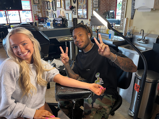 Explore back of the arm tattoo ideas, creative tattoo ideas in Venice, available at Ink Monkey Tattoo and Piercing