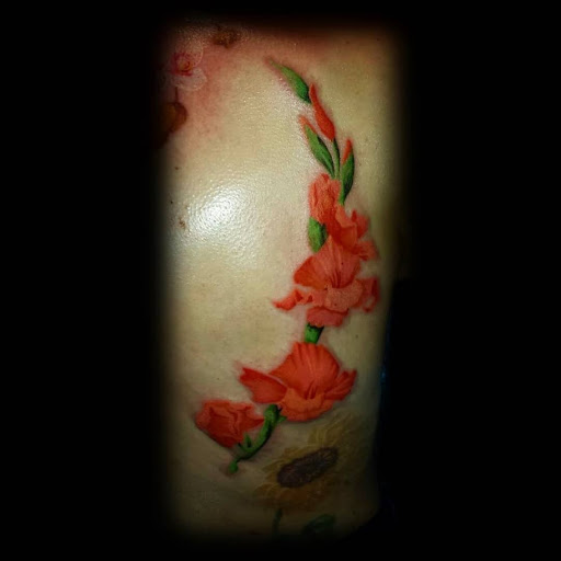 Tattoo Shop «Tit 4 Tat Tattoo Studio Inc.», reviews and photos, 45571 Mound Rd, Shelby Charter Township, MI 48317, USA