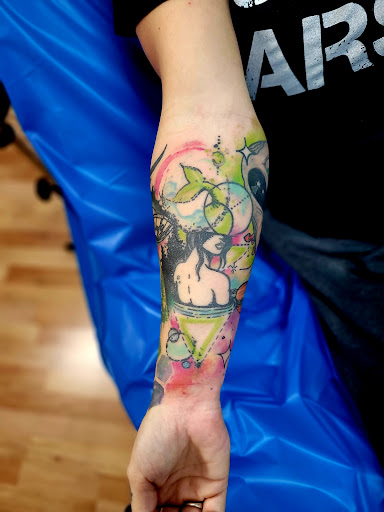 Explore assassins creed tattoo ideas, creative tattoo ideas in Benton, available at Spectrum Tattoo