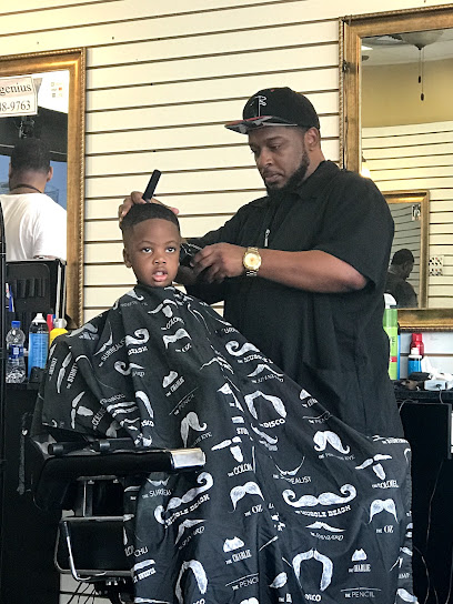 RAYKEL'S PRECISION CUTS BARBERSHOP & NATURAL HAIRCARE SERVICES
