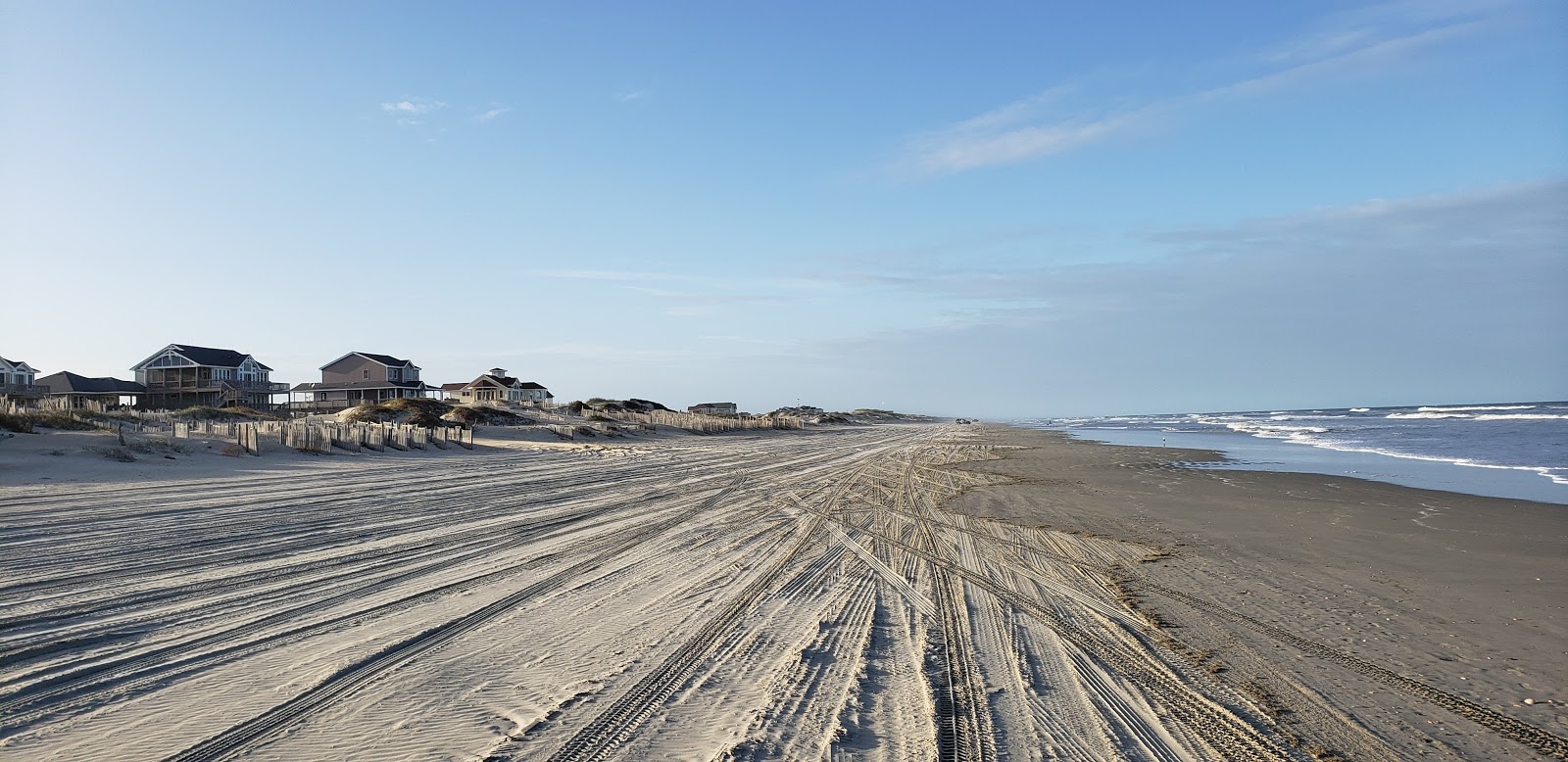 Foto de Carova beach com linha costeira longa e reta