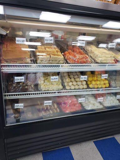 Grocery Store «INDU INDIAN GROCERY STORE (INDU CONVENIENT STORE)», reviews and photos, 4925 W Market St #1104, Greensboro, NC 27407, USA