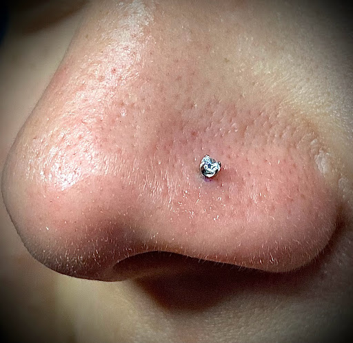 Explore honor tattoo ideas, creative tattoo ideas in Orange, available at Symbiosis Body Piercing