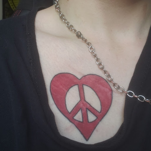 Explore female side tattoo ideas, creative tattoo ideas in Hinesville, available at Venom and Virtue
