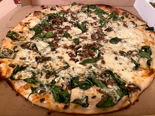 White Spinach pizza and we added mushrooms 