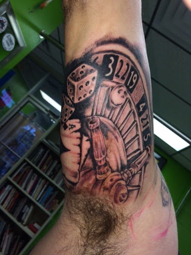 Explore lion and the lamb tattoo ideas, creative tattoo ideas in League City, available at Zen Body Art & Adornment Tattoo Shop