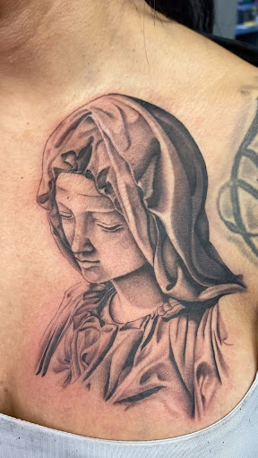 Explore tattoo ideas for men upper arm, creative tattoo ideas in San Diego, available at Hustle Tattoo & Piercing Studio