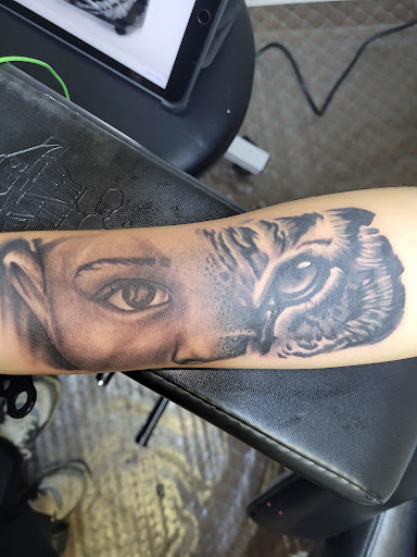 Explore bell tattoo ideas, creative tattoo ideas in Angola, available at Hoodlum Ink