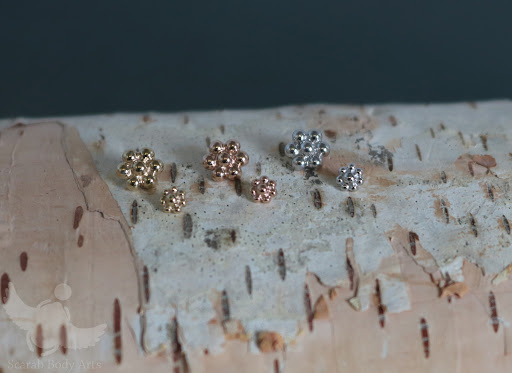 Explore women's quarter sleeve tattoo ideas, creative tattoo ideas in Syracuse, available at Scarab Body Arts