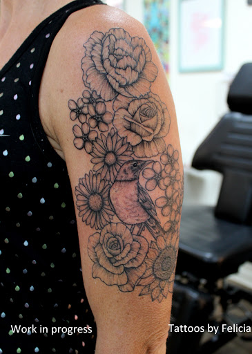 Explore fullback tattoo ideas, creative tattoo ideas in Fort Myers, available at Tiger Lotus Tattoo and Piercing