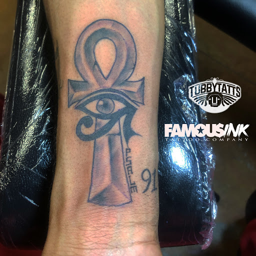 Find garter belt tattoo ideas for your next unique tattoo in Hammond at Famous Ink, Inc.