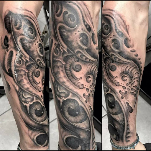 Explore kaneki tattoo ideas, creative tattoo ideas in Edgewood, available at Evolved Body Arts