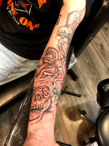 Explore garter tattoo ideas, creative tattoo ideas in Lexington, available at LexInk Tattoo