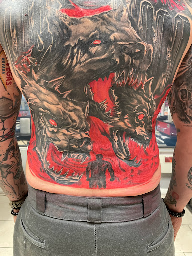 Explore 3/4 sleeve tattoo ideas, creative tattoo ideas in Ocoee, available at Slaughterized Ink Tattoo and Piercing Studio