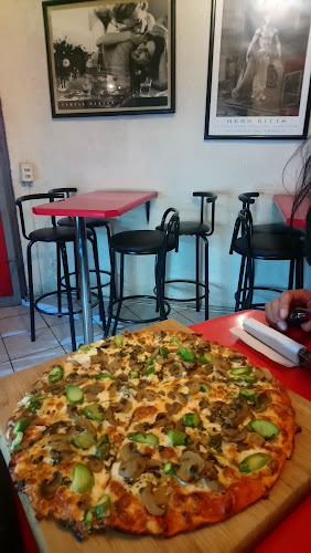 Opiniones de Pizzarte .Compañia 2153 L 3 en Estación Central - Restaurante