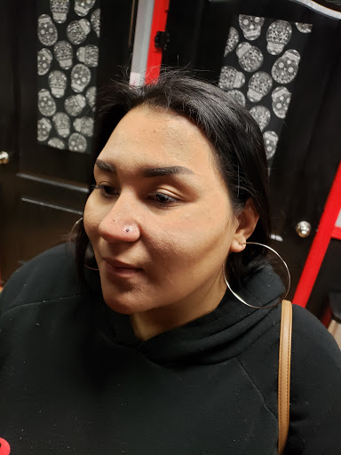 Find garter belt tattoo ideas for your next unique tattoo in Yuba City at The Piercing Queen 530