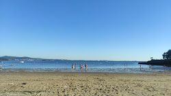 Porron beach'in fotoğrafı geniş ile birlikte