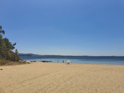 Beach das Cunchas'in fotoğrafı geniş bir kıyı şeridi ile birlikte