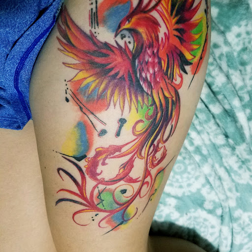 Explore tattoo ideas black people, creative tattoo ideas in Summerville, available at Mystic Tiki Tattoo Studio & Gallery