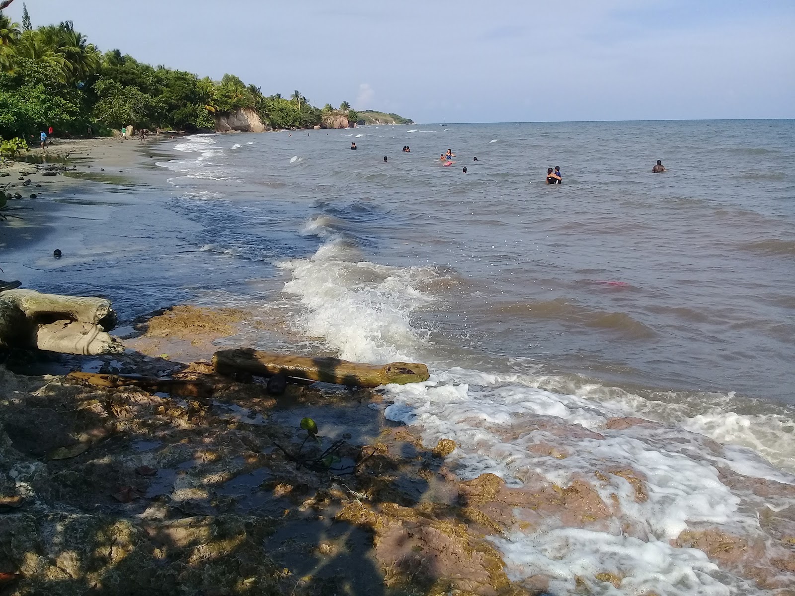 Foto di Spiaggia La Bocanita con una superficie del sabbia beige