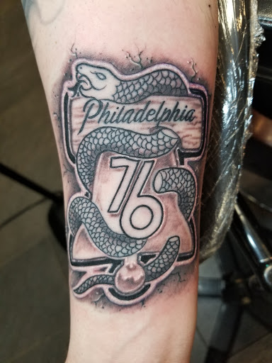 Explore astronomical tattoo ideas, creative tattoo ideas in Burlington, available at Mr Tattoos & Piercing