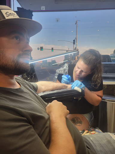 Explore tattoo ideas for photographers, creative tattoo ideas in Spokane, available at PNW Tattoo