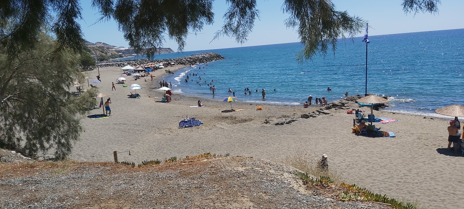 Photo of Arvi beach with turquoise pure water surface