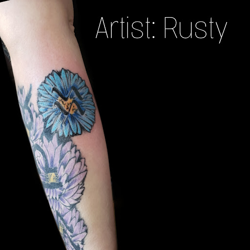 Explore little mermaid tattoo ideas, creative tattoo ideas in Florence, available at West Coast Tattoo & Body Piercing